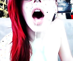 Emo redhead in glasses toys both holes