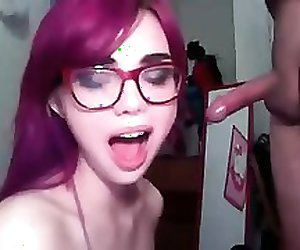 Emo purple hair hottie sucking cock