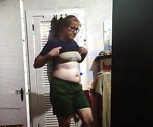wife taking off shirt bra chubby belly unaware